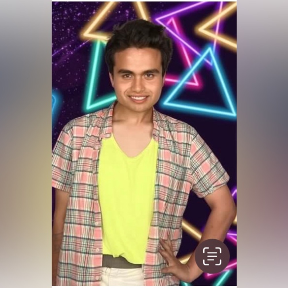 A neon pink short sleeve plaid button shirt